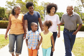 Multi Generation Georgia Family Walking In Park Together